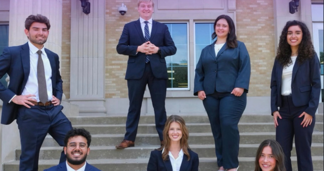 Mock trial students smile for a team picture.