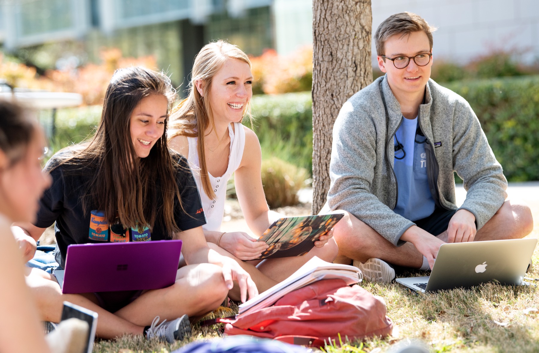 Students smile outside