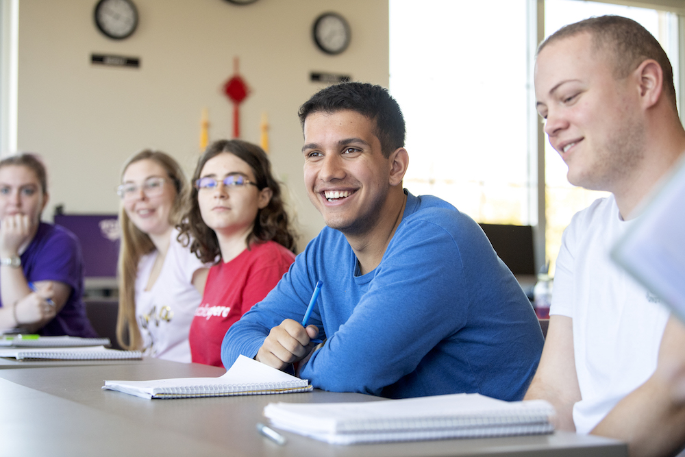 A student smiles during class