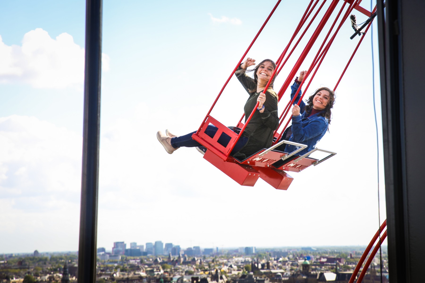 Students on a swing in Amsterdam