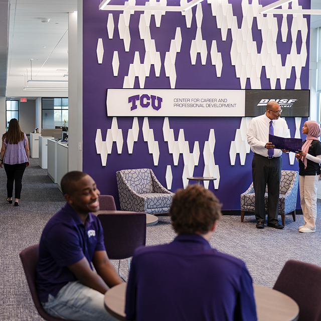 Students and staff converse in the TCU Career Services Center