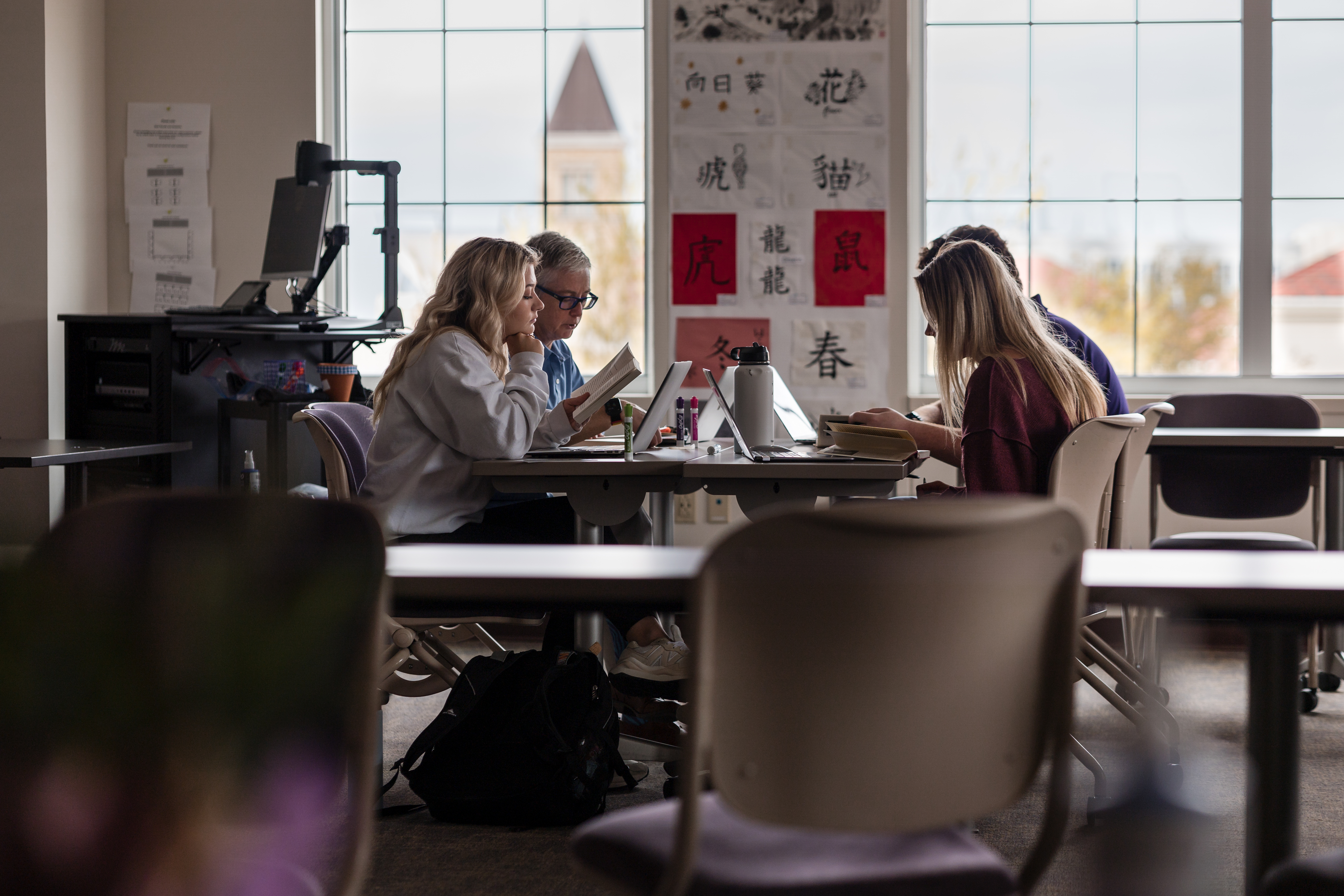 Scharbauer Hall: Muriel Cormican, professor of German and chair of the Department of Modern Languages in TCU’s AddRan College of Liberal Arts, leads an independent study class in German. Photo by James Anger on March 29, 2022.