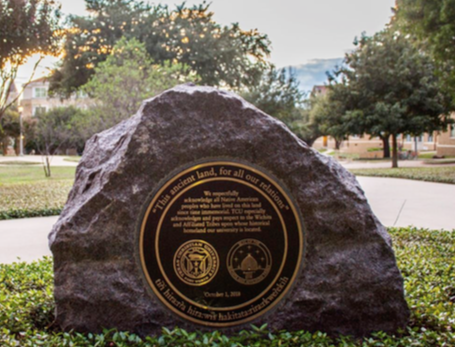A monument dedicated to Native American peoples on TCU's campus