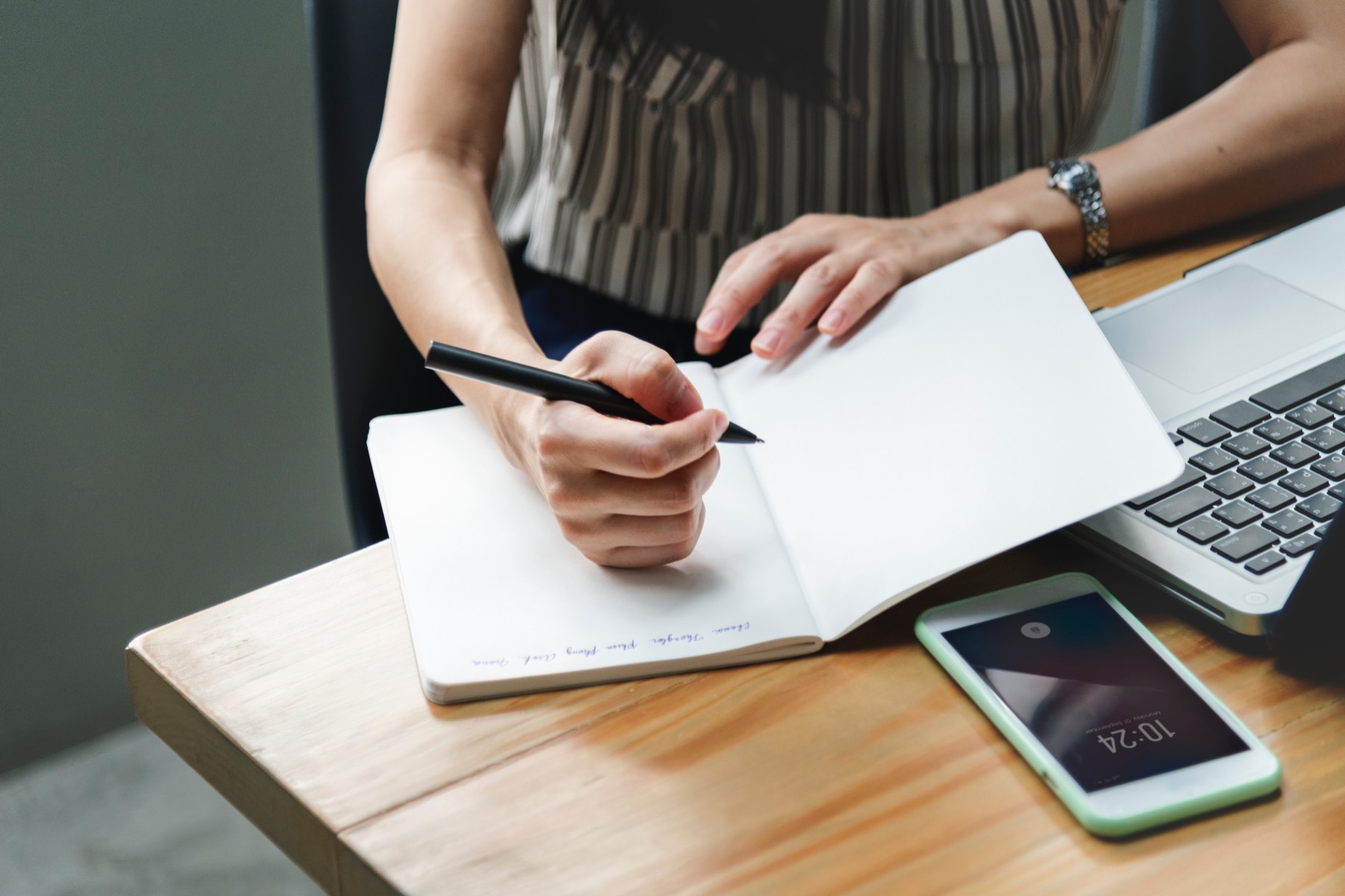 A student works in a notebook