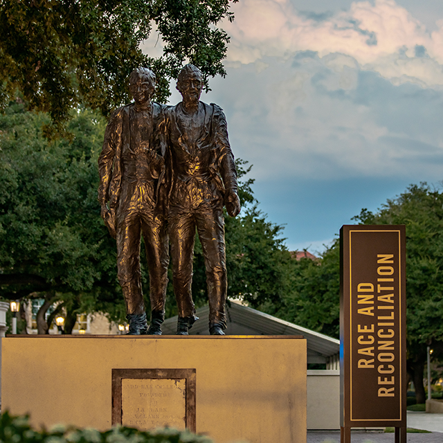A statue of TCU founders Addison and Randolph Clark