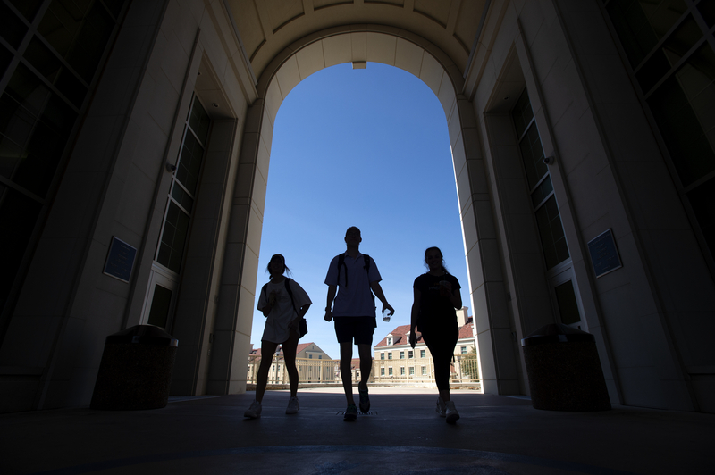 Students walking on campus.